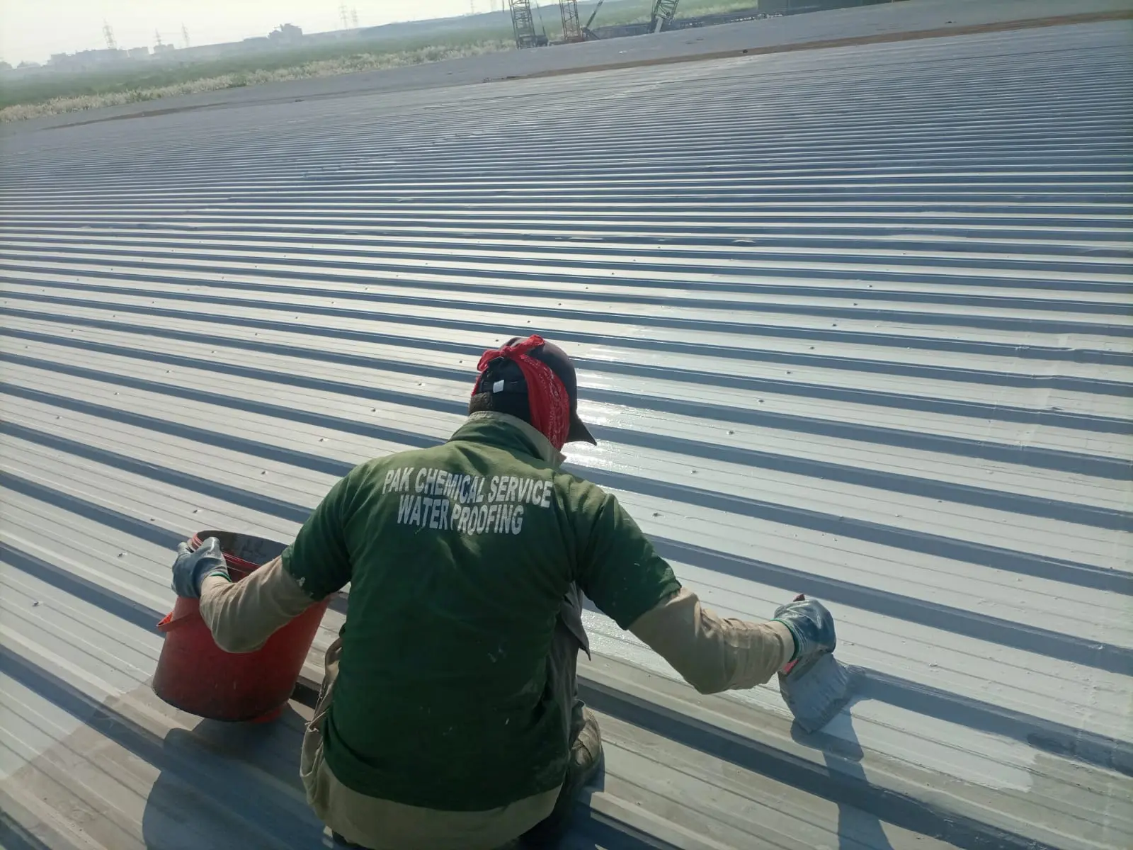 Pak Chemical Services GI sheets waterproofing work