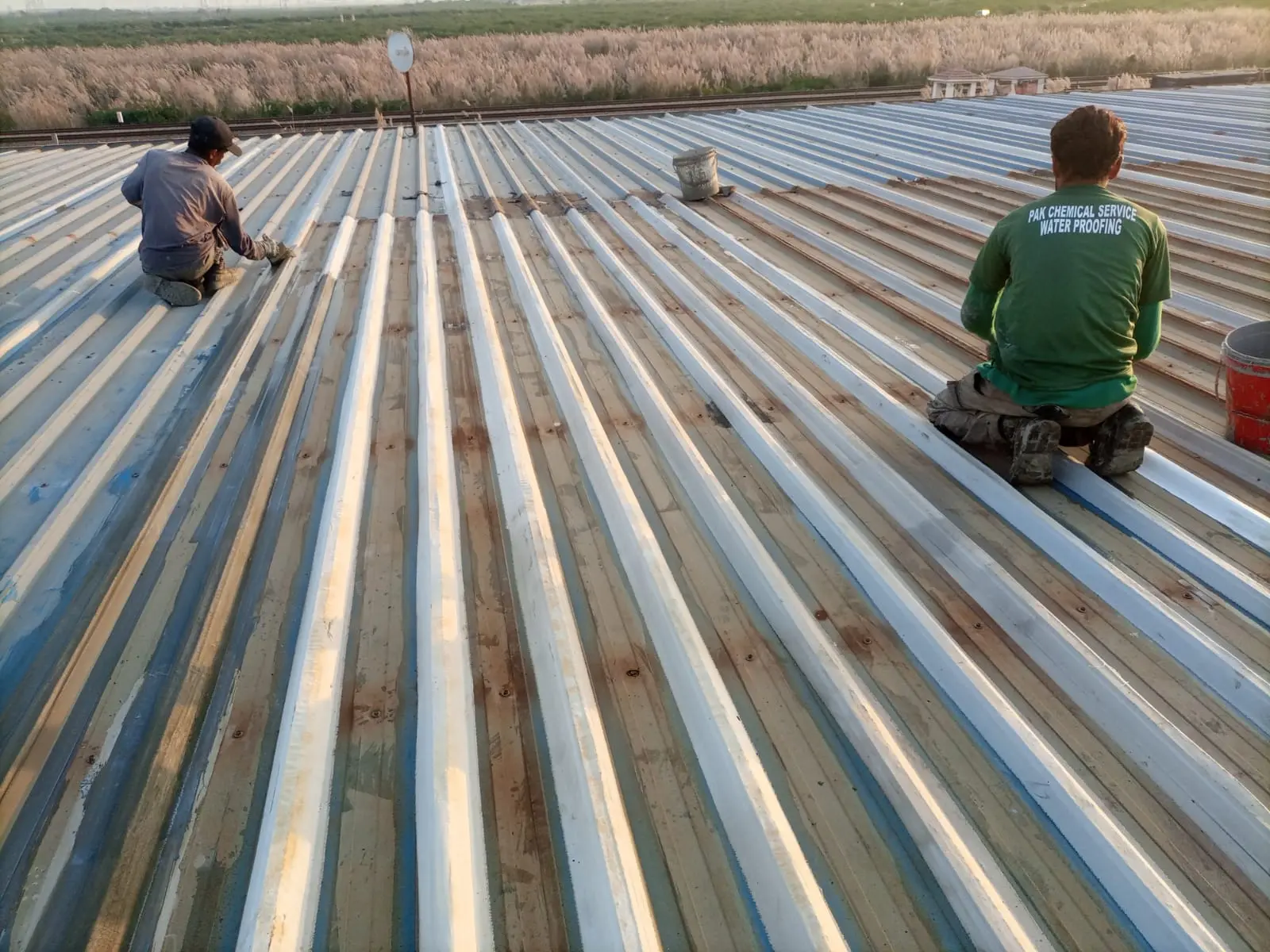 Pak Chemical Services GI sheets waterproofing work